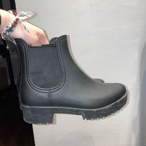 Black rain boots